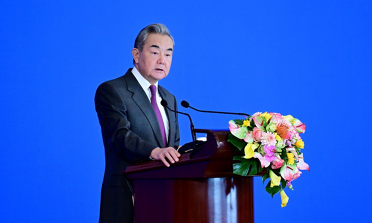 Chinese Foreign Minister Wang Yi addresses a symposium on the international situation and China's foreign relations in 2025 in Beijing on December 30, 2025. Photo: Chinese Foreign Ministry