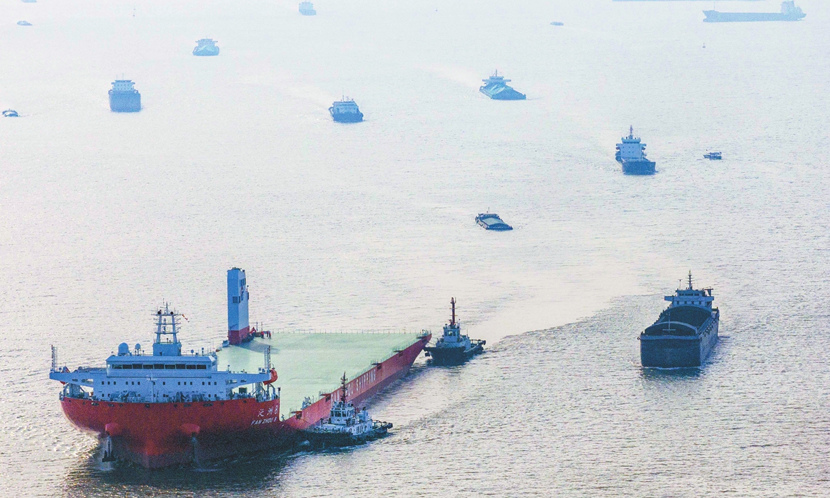 The <em>Fanzhou 8</em> heavy load carrier, the largest self-propelled deck ship in the world by carrying capacity, sails on the Yangtze River on December 22, 2024. Photo:VCG